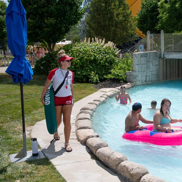 Lifeguard standing near the lazy river