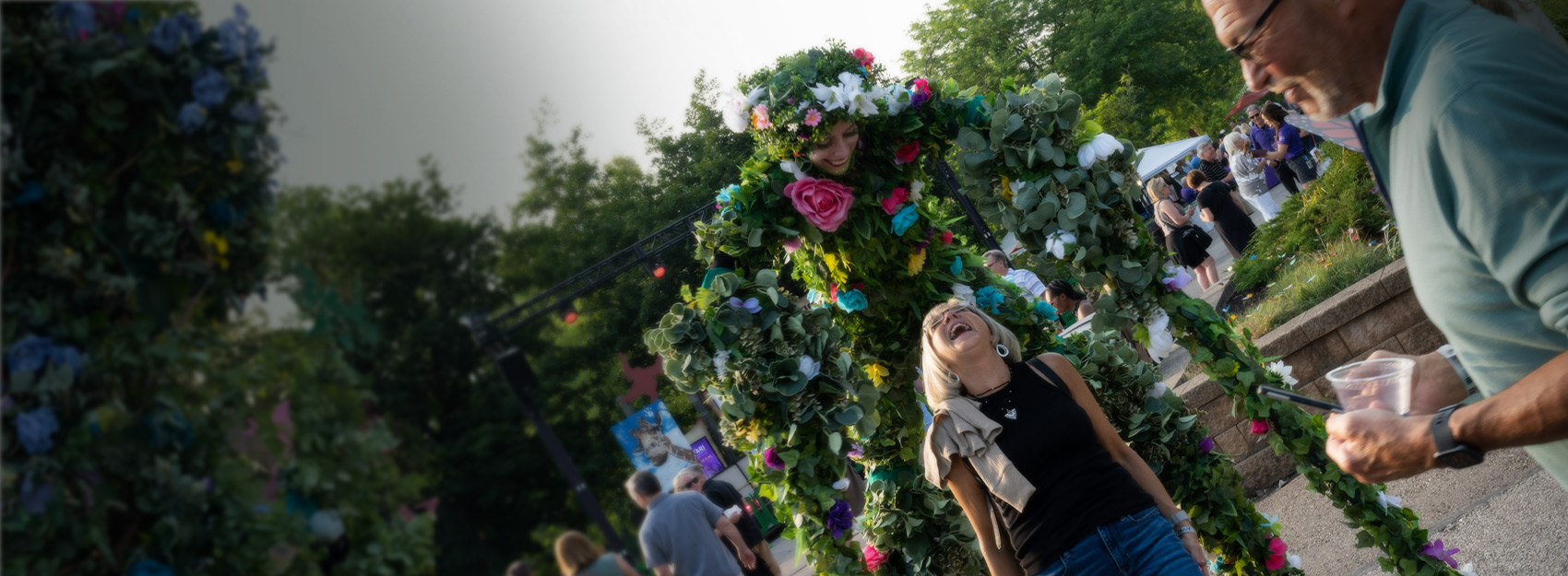 woman laughing with tree artist