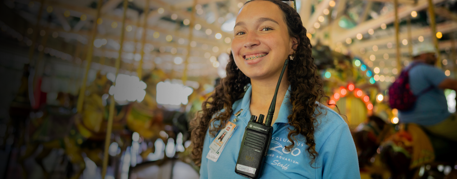 Zoo intern near carousel