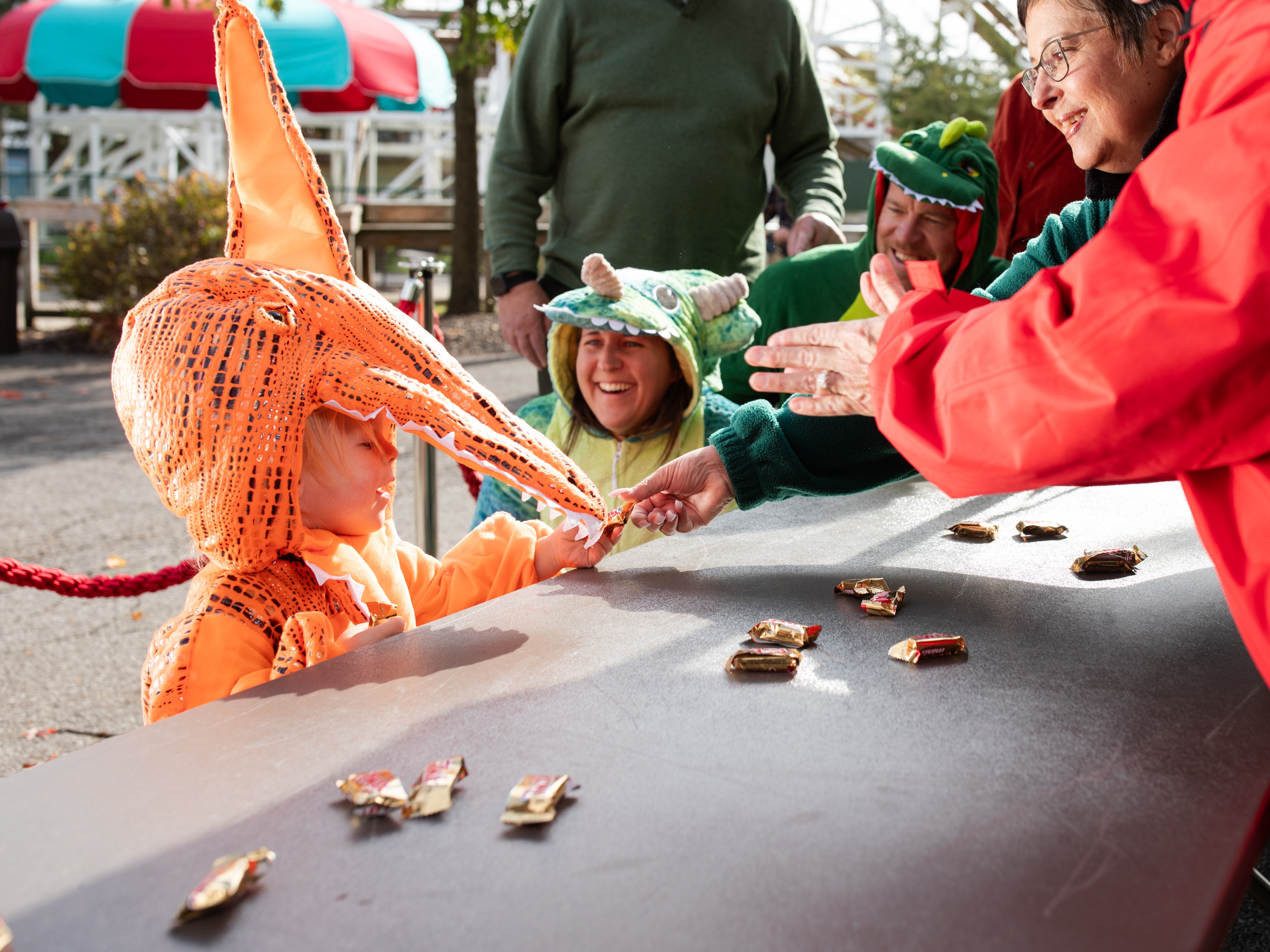 child receiving halloween candy at the Columbus Zoo