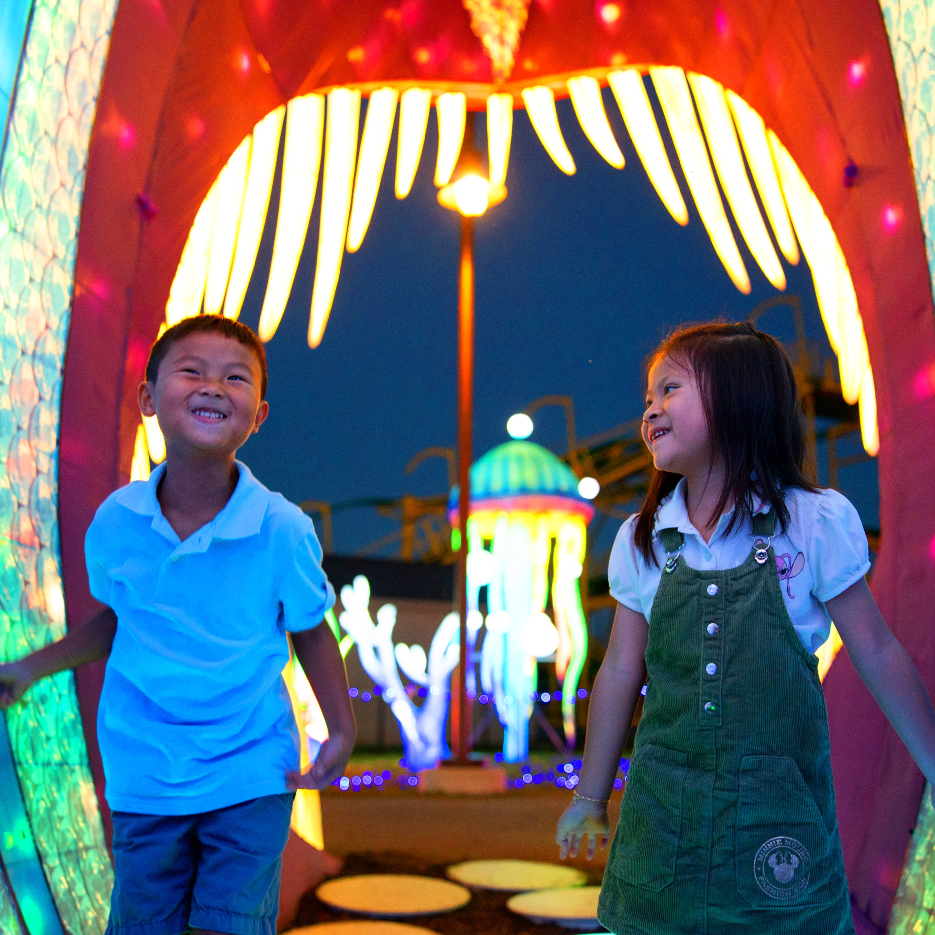 children laughing in tunnel