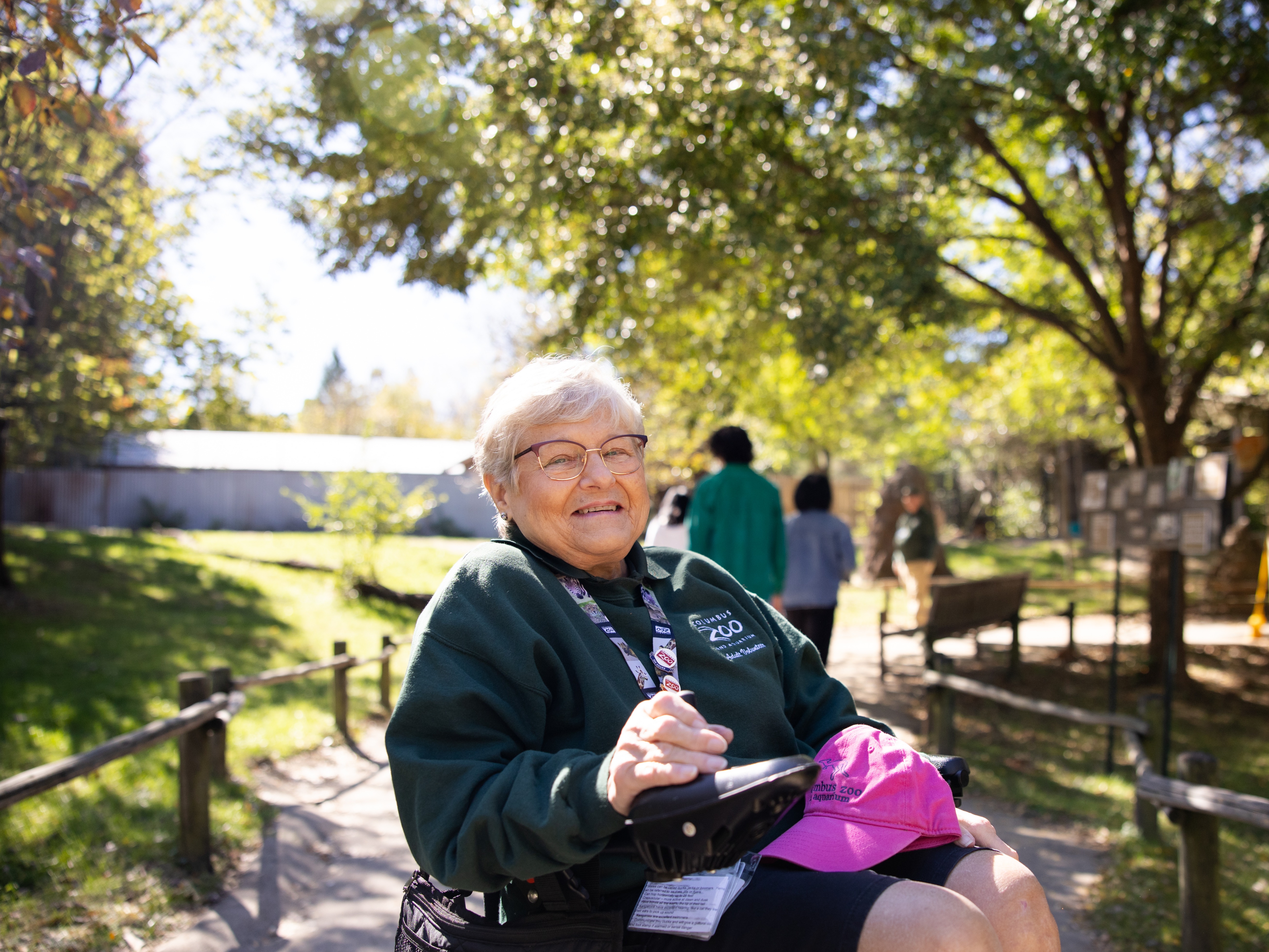 zoo volunteer smiling at camera