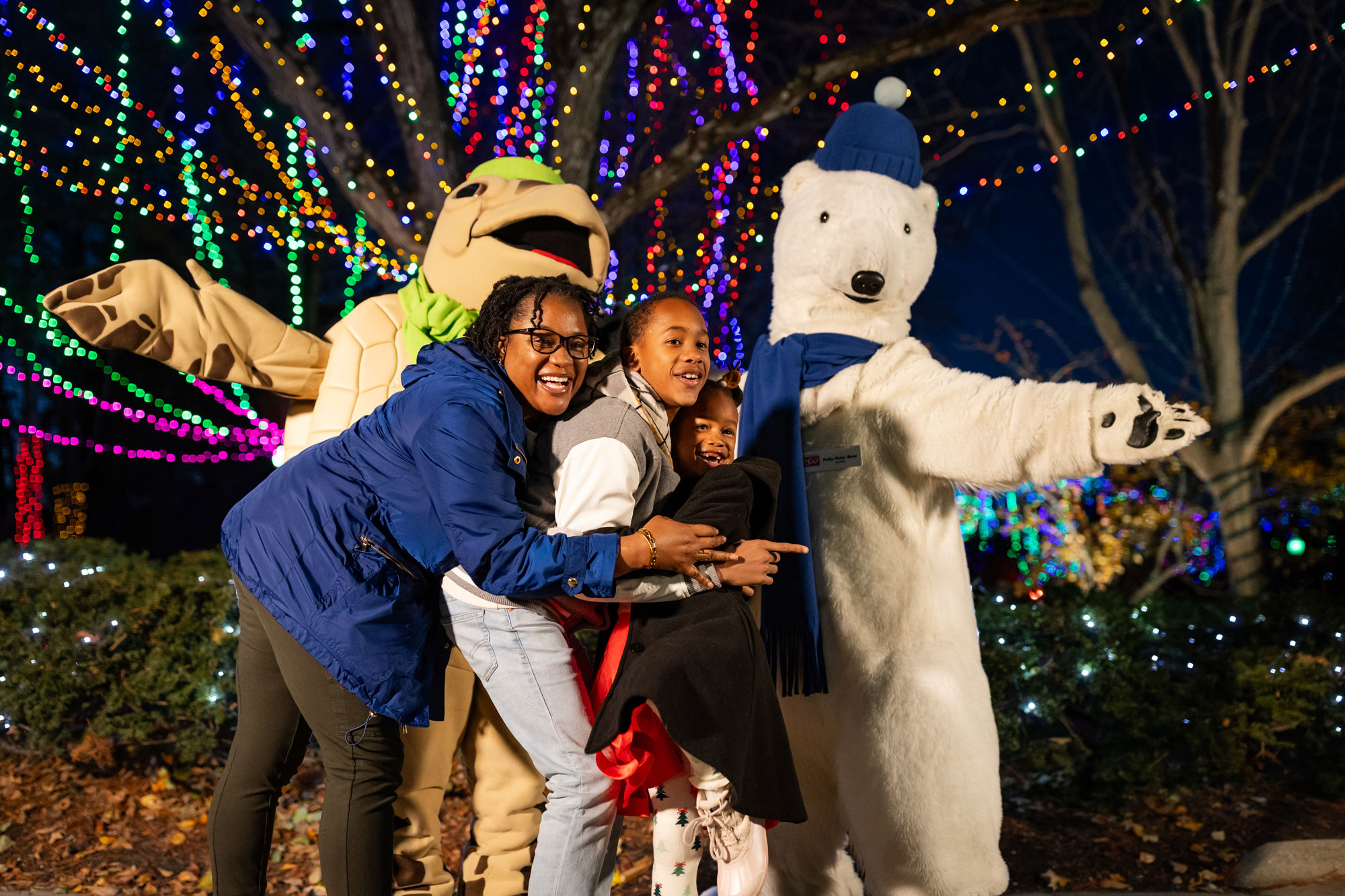 Wildlights Character meet and greet family with polar bear and turtle