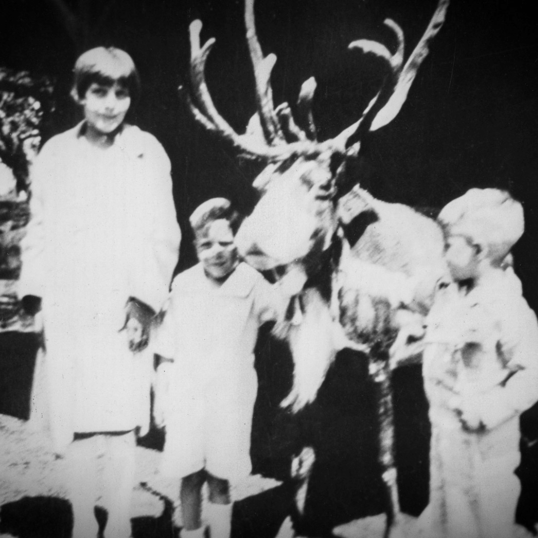 historical photo of children with reindeer