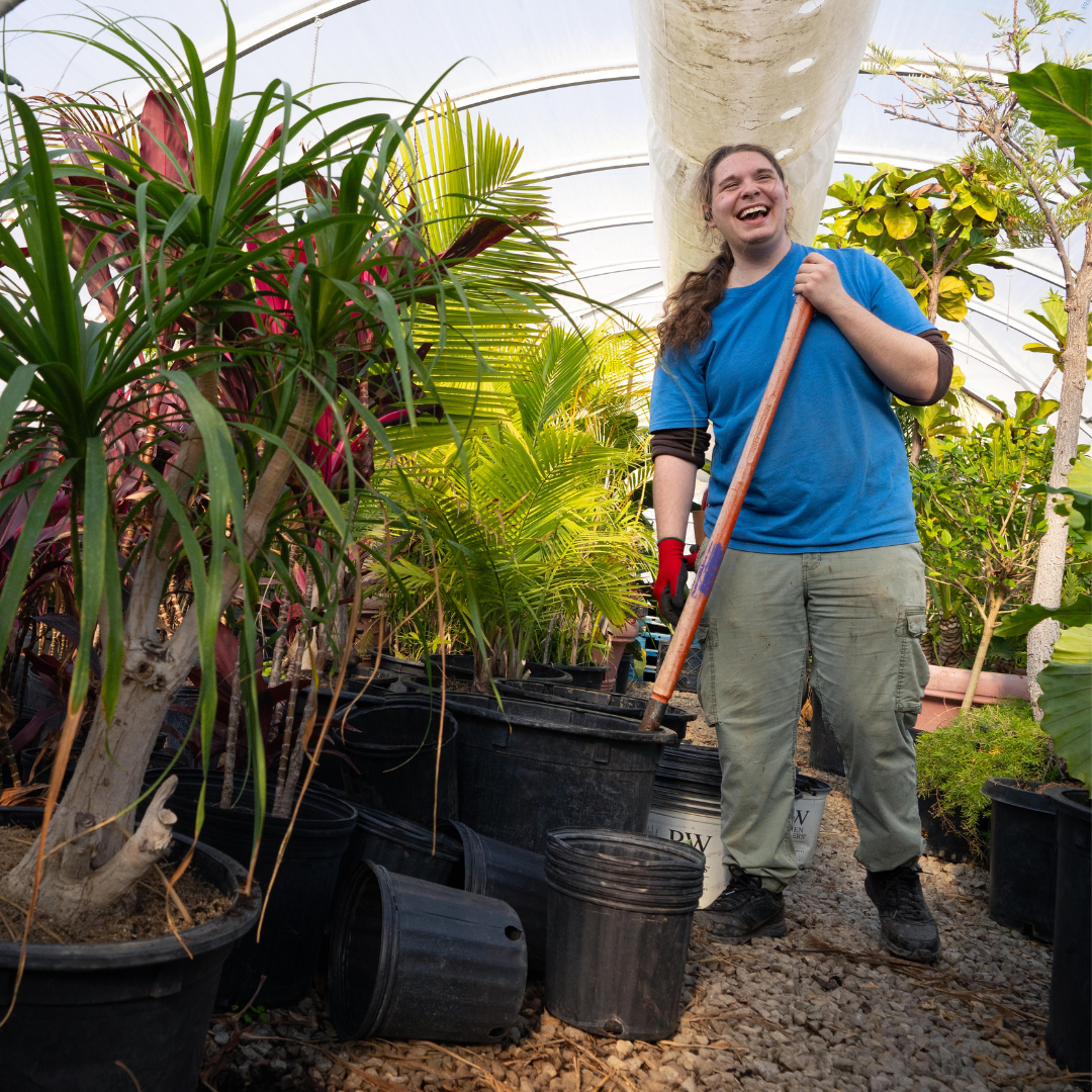 high school volunteer in garden