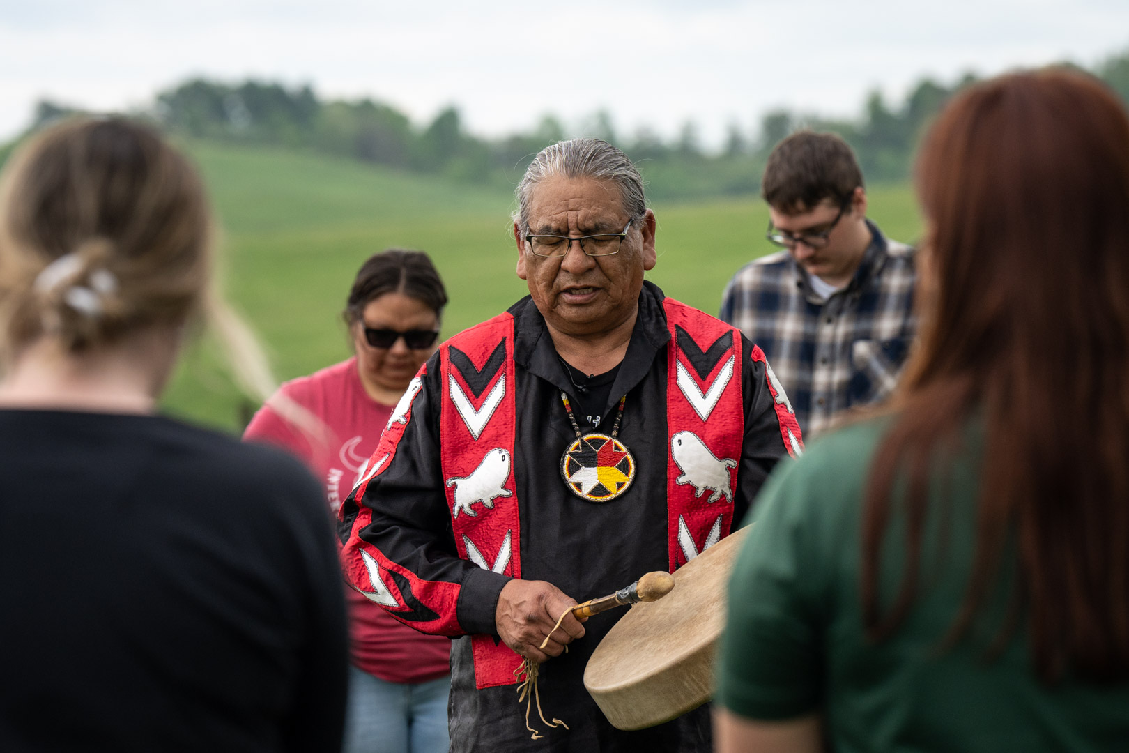 man holding drum