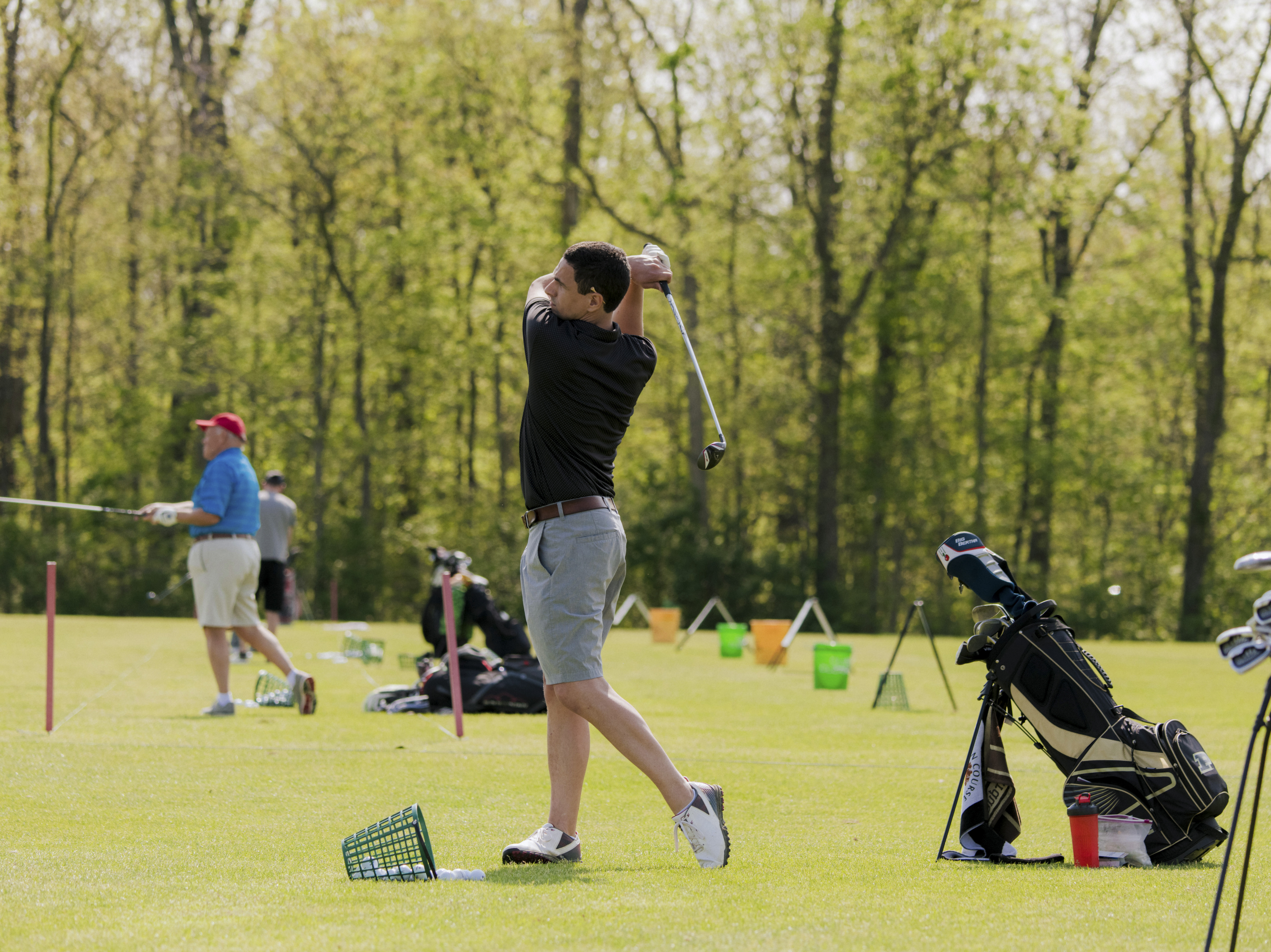 golfer on driving range in Columbus, OH