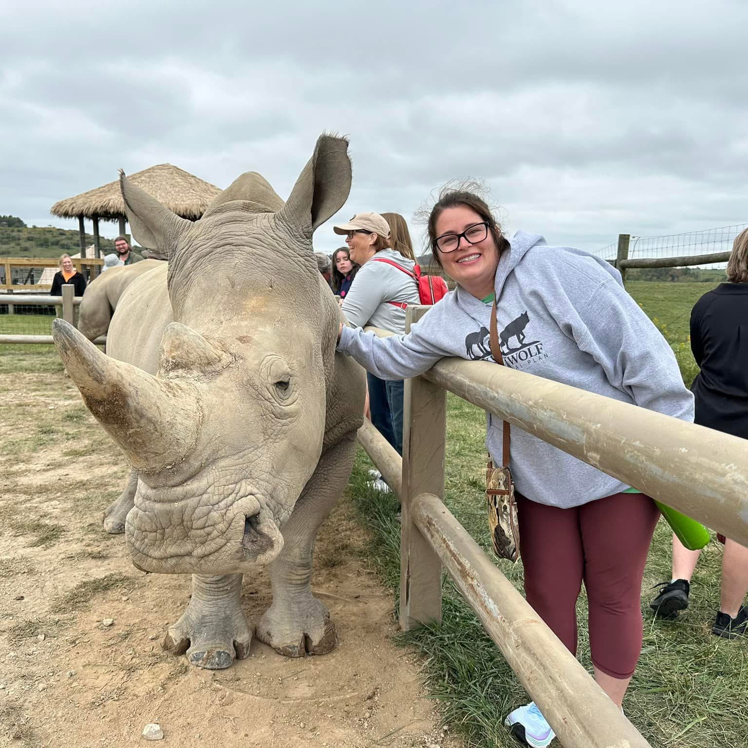 woman and rhino at The WIlds