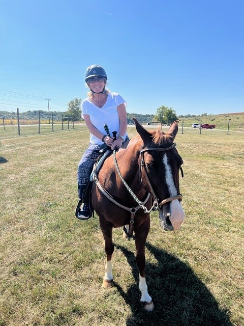 woman riding horse