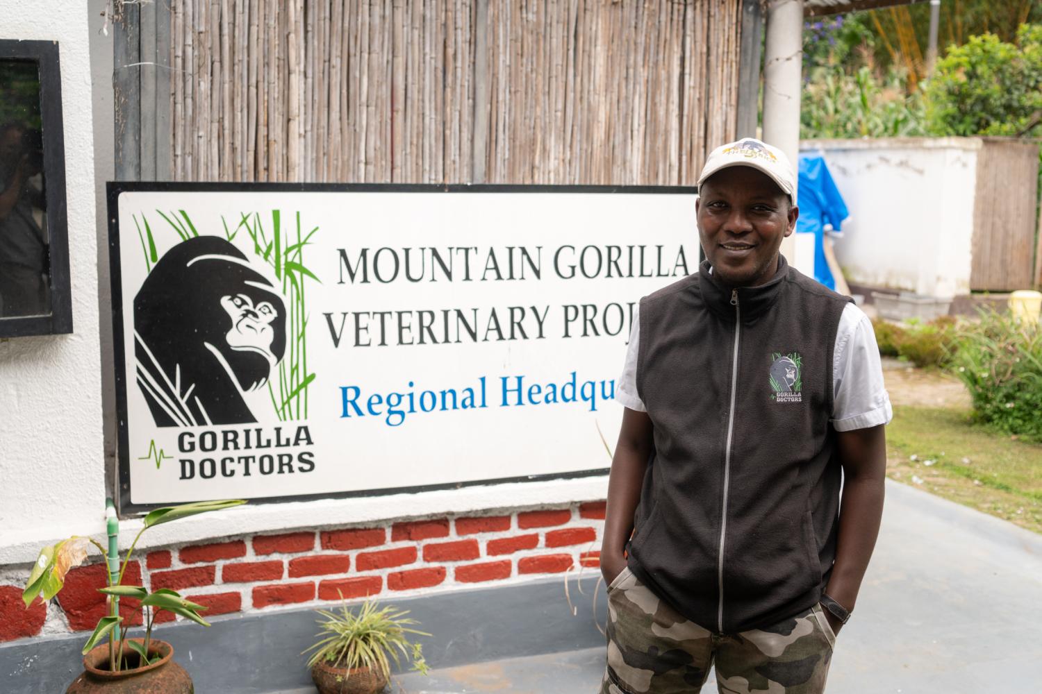 man standing in front of sign