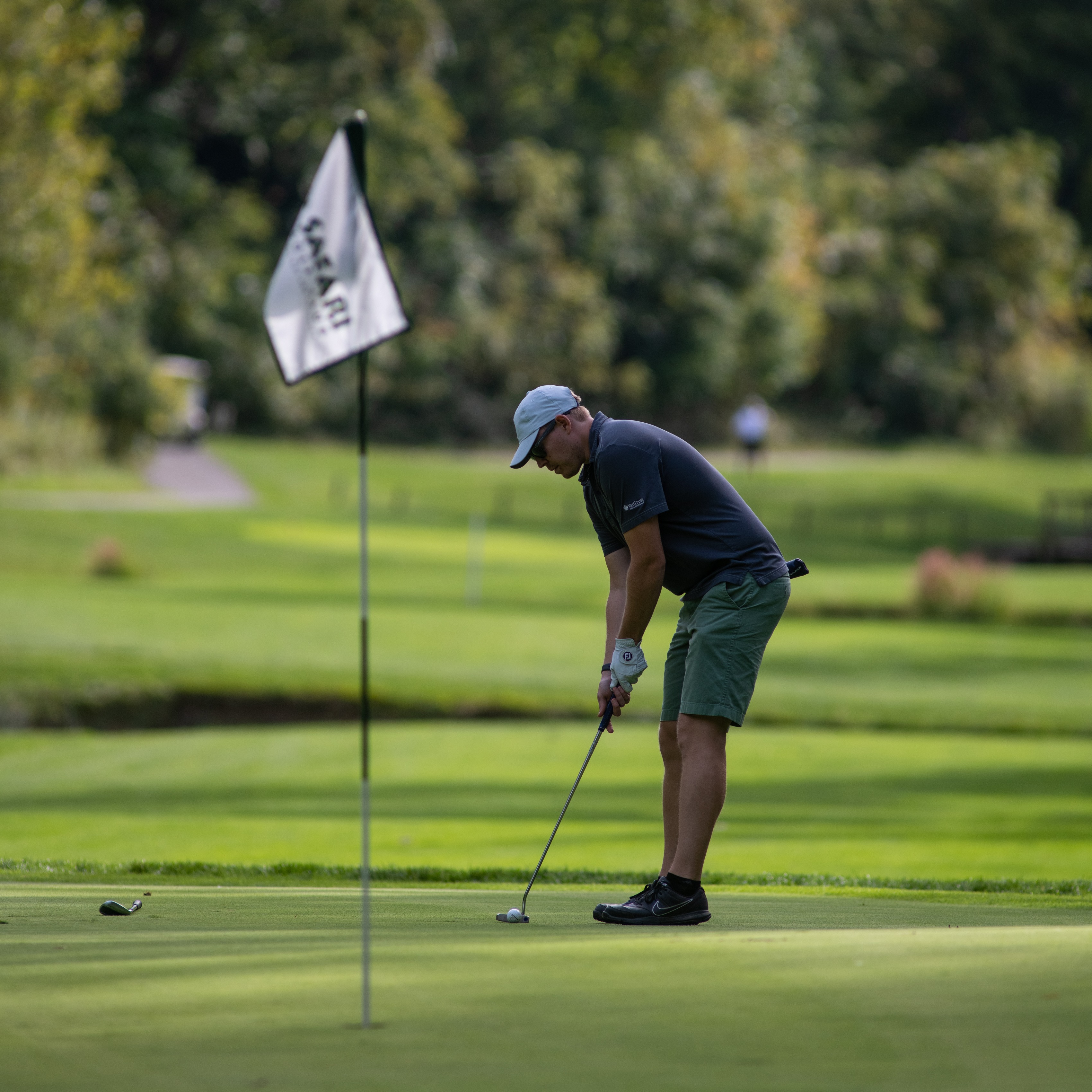 man golfing