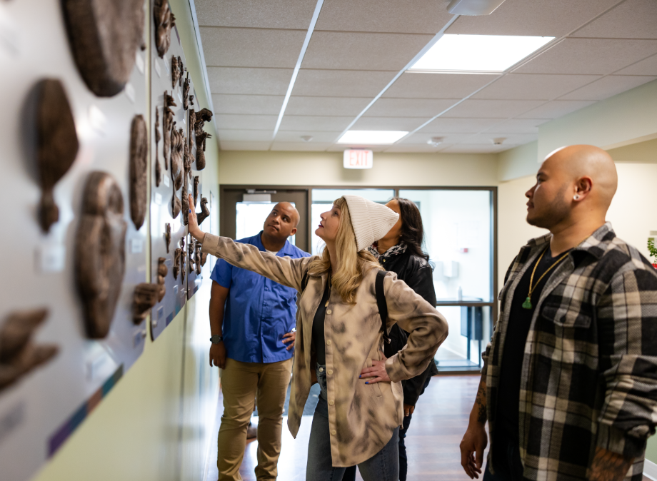 zoo guests looking at wall in health center
