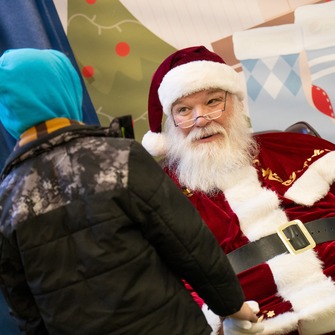 Santa looking at child