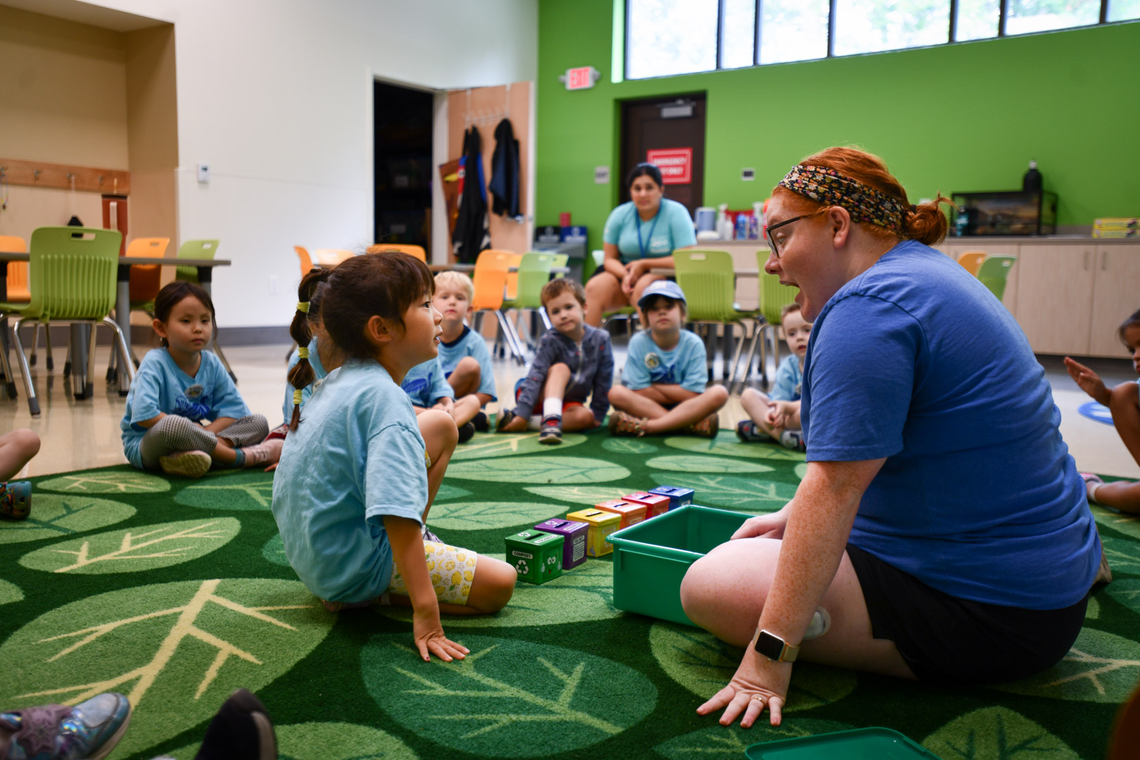zoo staff teaching children