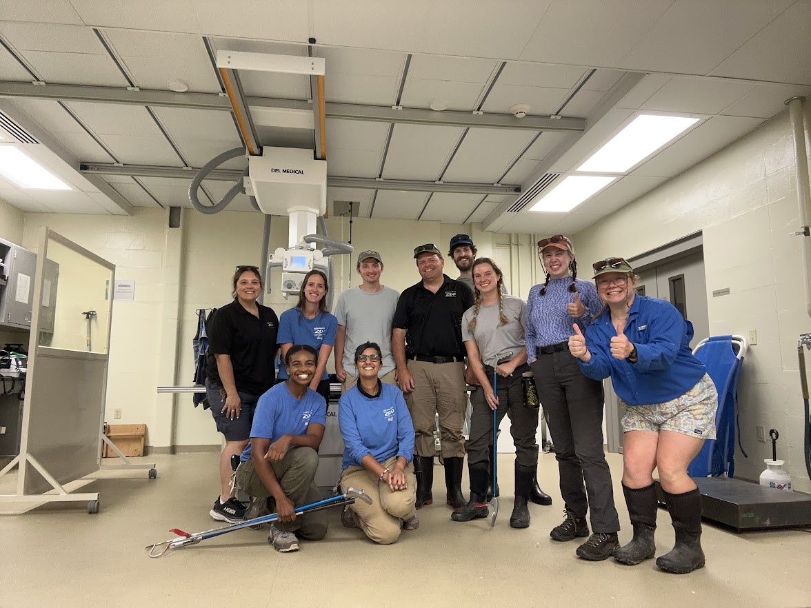 group of people posing for photo