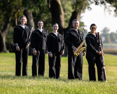 US Navy musicians posing for picture