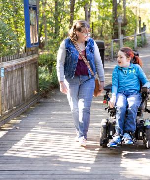 zoo guests on boardwalk