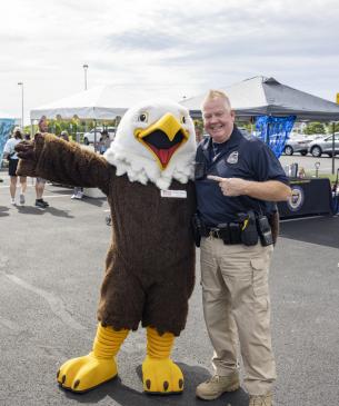 eagle mascot and police officer
