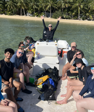 students posing on boat