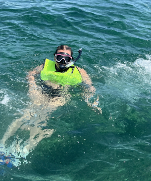 student in water
