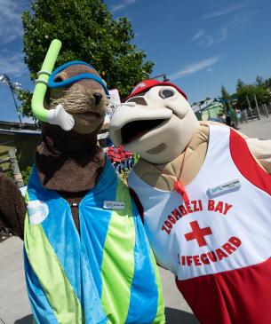 two zoo mascots at Zoombezi Bay