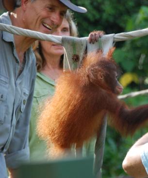 Jack Hanna smiling at an orangutan, photo credit Rick Prebeg