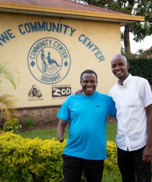 men standing in front of school