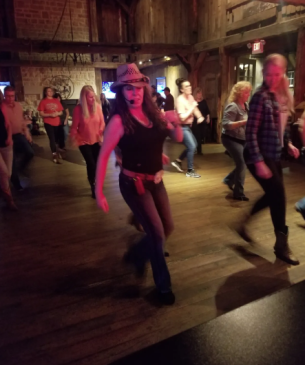 woman line dancing