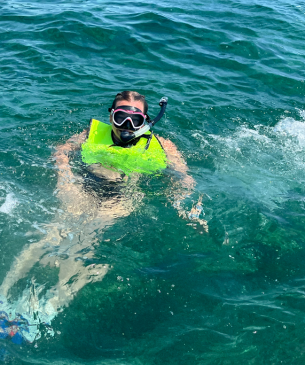 student snorkeling