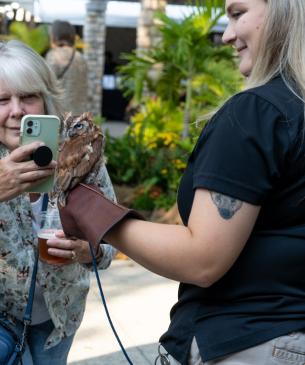 keeper holding animal