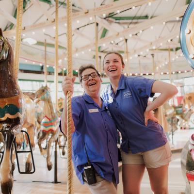 Zoo team members enjoying carousel