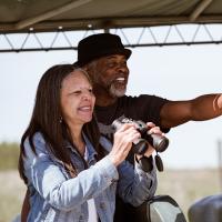 Two people birding at The Wilds