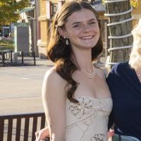woman posing for photo in outdoor setting