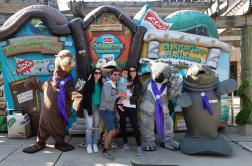 People posing with Character Ambassadors