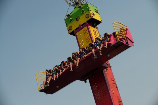 zoo guests on amusement park drop ride