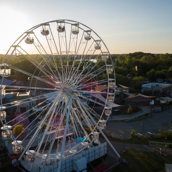 aerial view of Ferris wheel at sunset