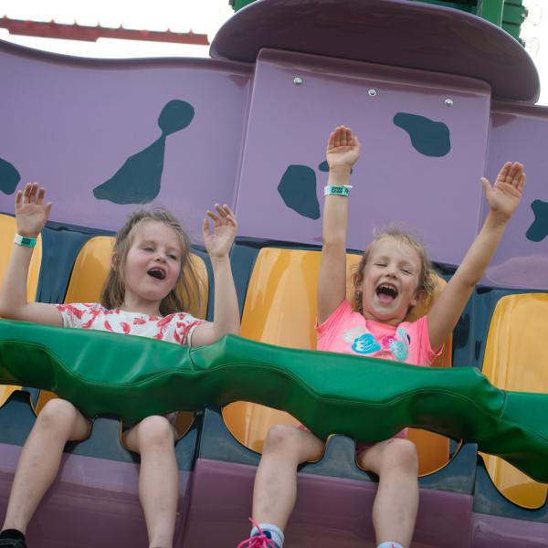 kids on frog hopper ride