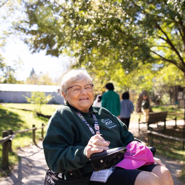 zoo volunteer smiling at camera