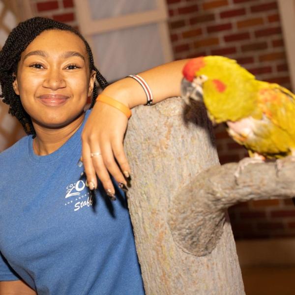 Adanna Davis with parrot