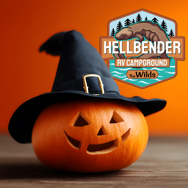 jack-o-lantern wearing witch hat with a campground logo in the background