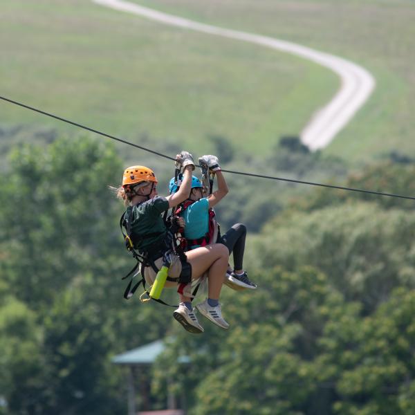 Ziplining over trees and fields