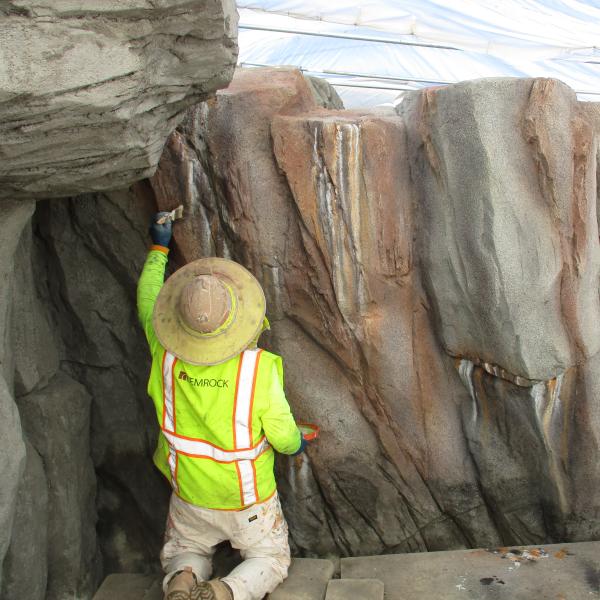 artist painting rock