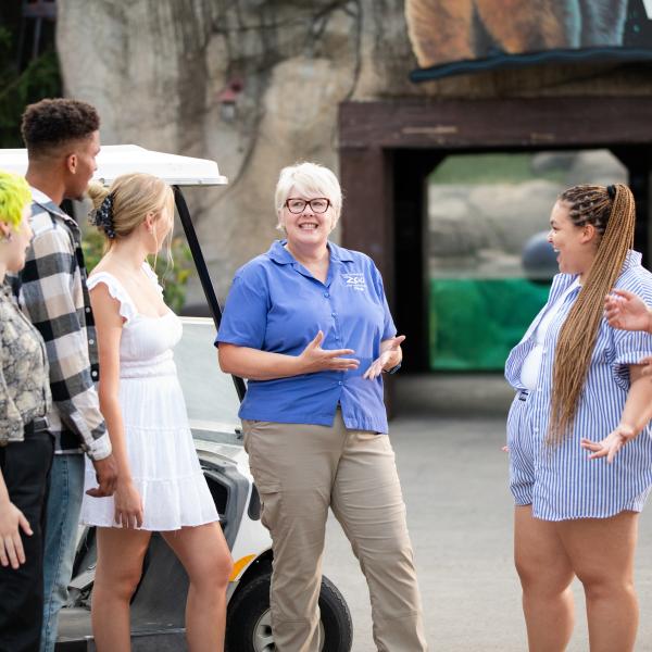 Zoo tour guide and guests