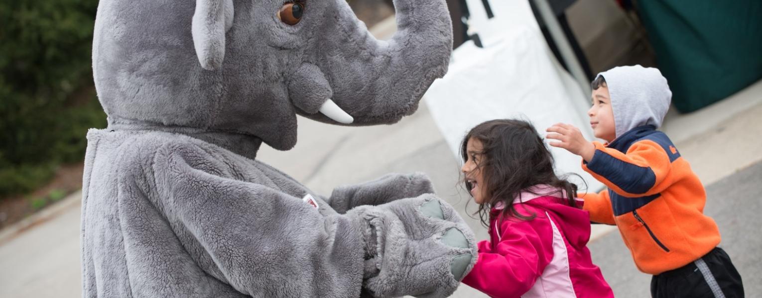 Zoo mascot and children